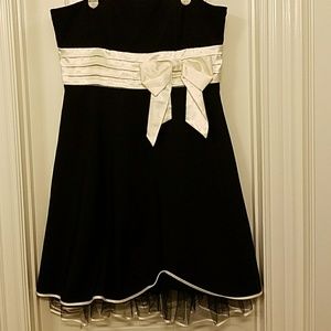 Strapless black formal dress with cream sash